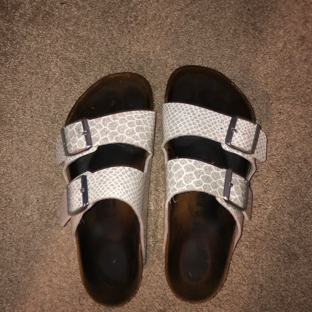 silver and white snakeskin birkenstock’s